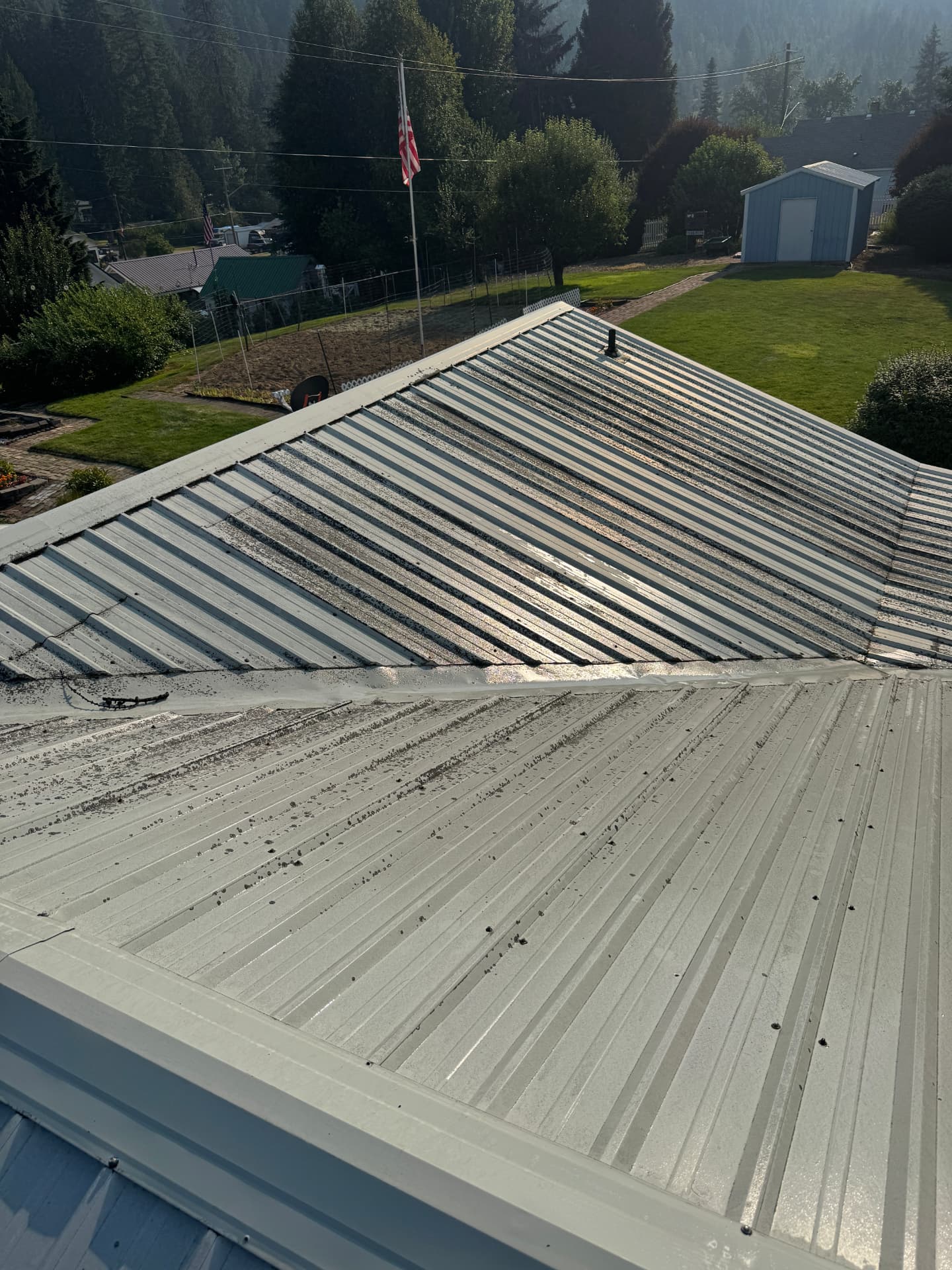 Metal roof cleaning before pressure washing